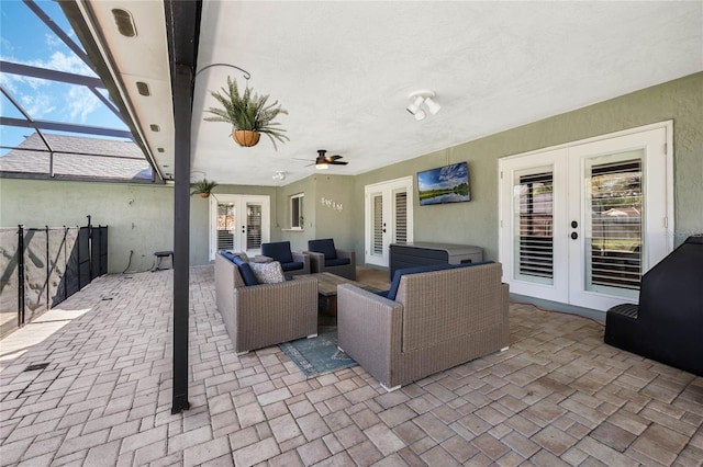 view of patio / terrace with an outdoor living space, glass enclosure, and french doors