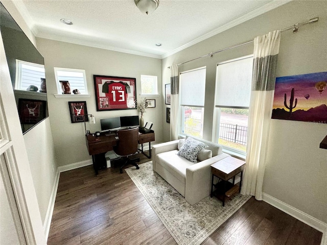 office area with wood-type flooring, a textured ceiling, baseboards, and crown molding