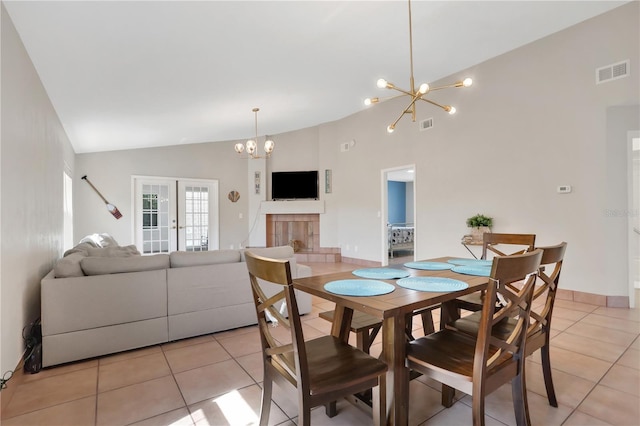 44 Capistrano Dr, Ormond Beach, FL 32176 - dining room with a chandelier, french doors, visible vents, and light tile patterned floors