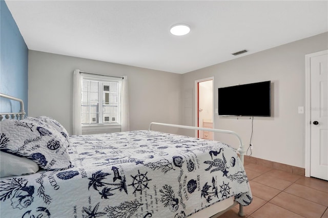 44 Capistrano Dr, Ormond Beach, FL 32176 - tiled bedroom with baseboards and visible vents