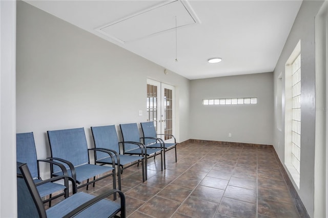 44 Capistrano Dr, Ormond Beach, FL 32176 - sitting room with attic access, french doors, and baseboards