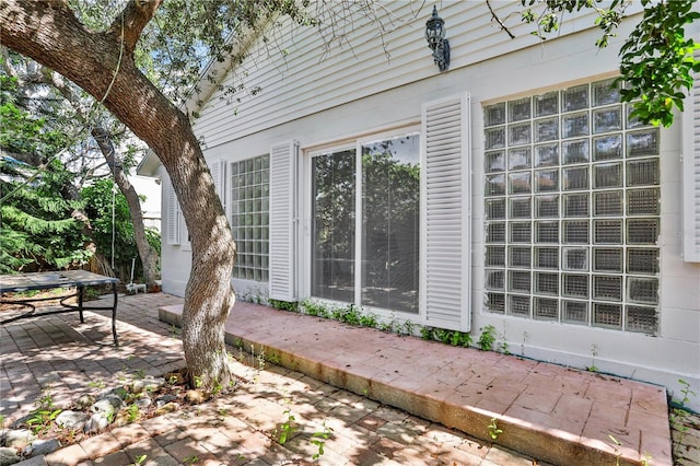 44 Capistrano Dr, Ormond Beach, FL 32176 - view of property exterior with a patio area