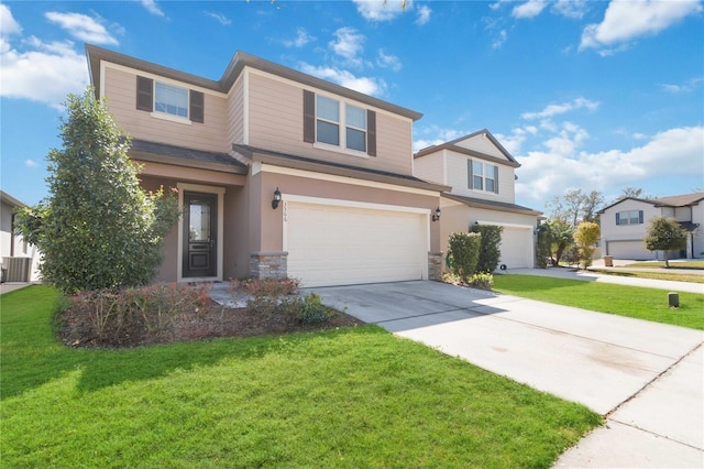 view of front of home featuring a garage, driveway, stone siding, and a front yard