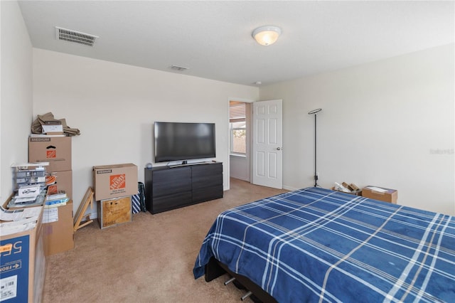 bedroom with carpet and visible vents