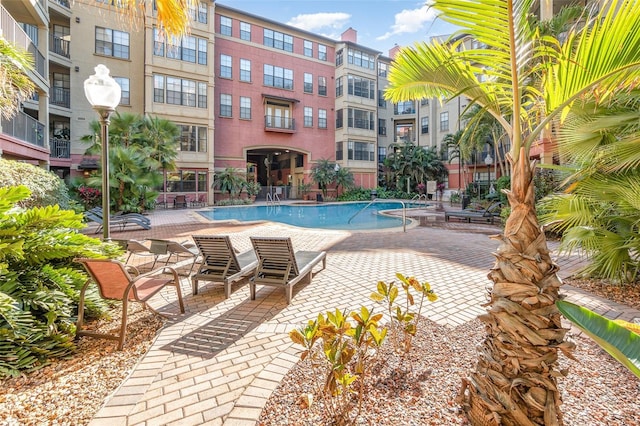 community pool featuring a patio