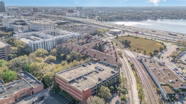 birds eye view of property with a water view