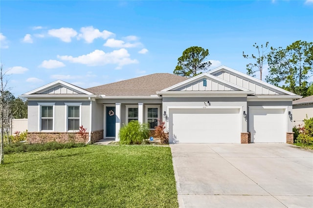 view of front of property with board and batten siding, a front yard, driveway, and a garage