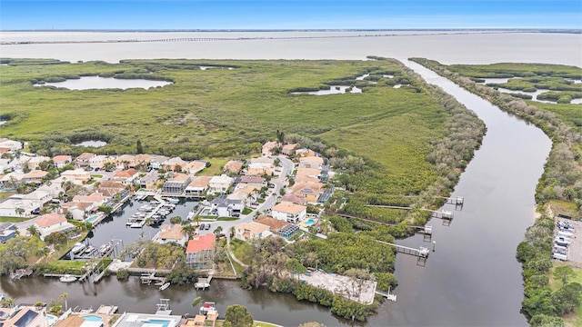 birds eye view of property featuring a residential view and a water view