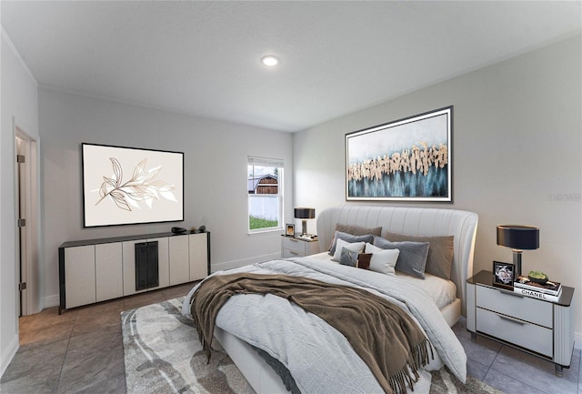 tiled bedroom featuring baseboards