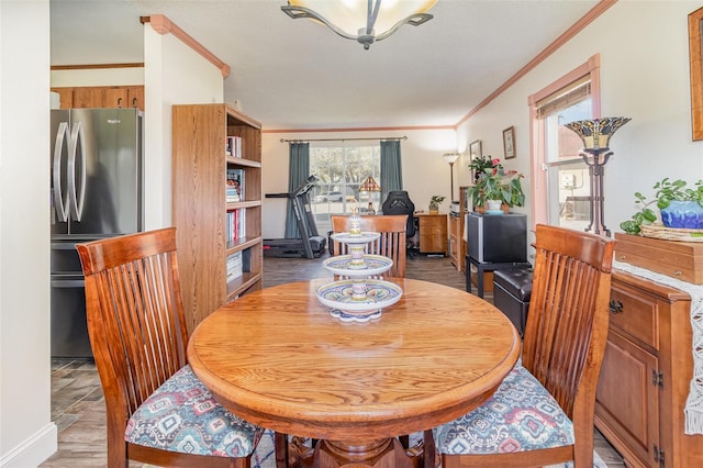 dining room with ornamental molding