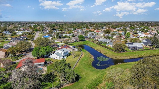 bird's eye view with a water view and a residential view