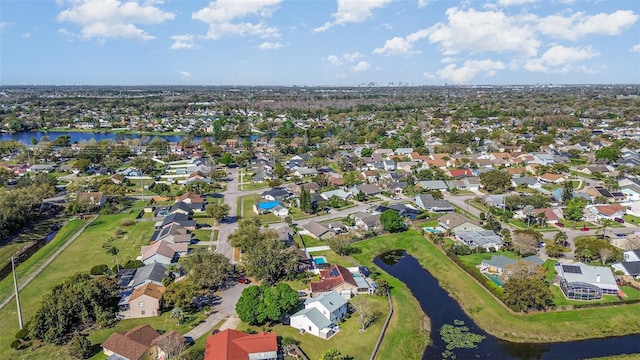 bird's eye view with a water view and a residential view