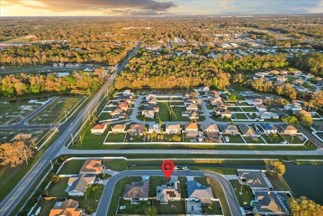 birds eye view of property with a residential view