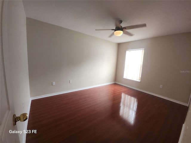 1346 Rolling River Rd, Deland, FL 32720 - unfurnished room with wood finished floors, a ceiling fan, and baseboards