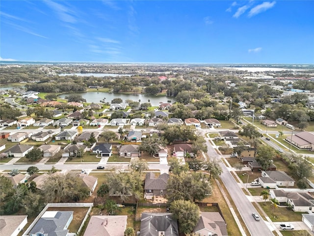 aerial view featuring a water view and a residential view