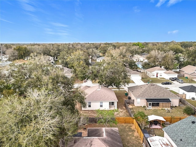 birds eye view of property with a residential view