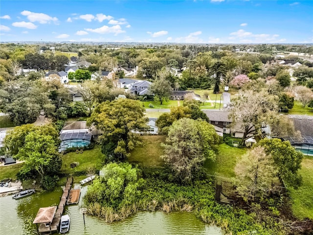 birds eye view of property featuring a water view and a residential view