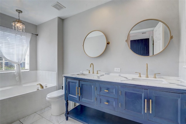 full bathroom with a relaxing tiled tub, double vanity, visible vents, and a sink