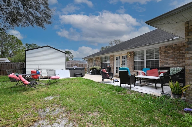 view of yard featuring fence and a patio