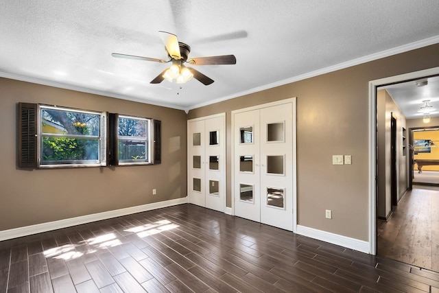 unfurnished bedroom featuring dark wood finished floors and baseboards