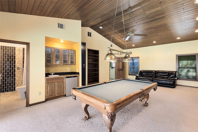 game room with light colored carpet, visible vents, a sink, and wet bar