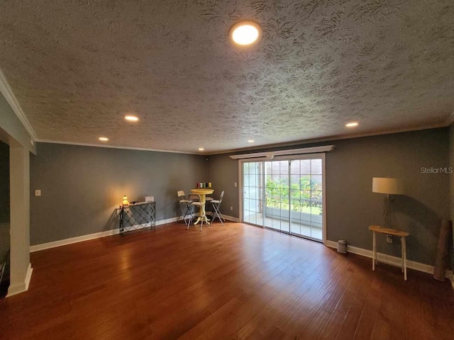 4214 Lake Underhill Rd Unit A, Orlando, FL 32803 - unfurnished room with ornamental molding, baseboards, wood finished floors, recessed lighting, and a textured ceiling