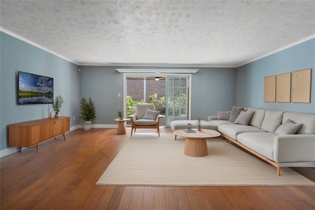 4214 Lake Underhill Rd Unit A, Orlando, FL 32803 - living area featuring wood-type flooring, crown molding, baseboards, and a textured ceiling