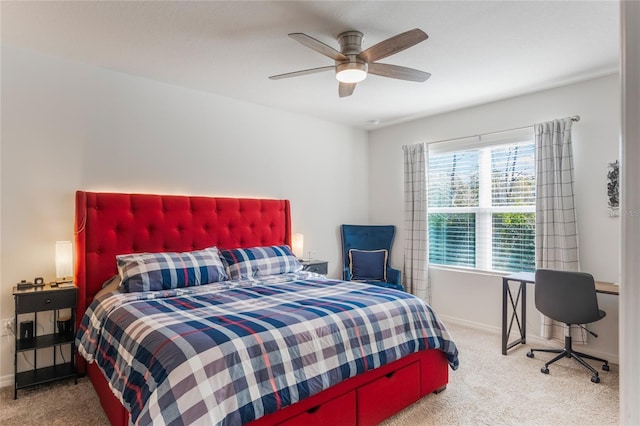 bedroom featuring carpet, baseboards, and a ceiling fan