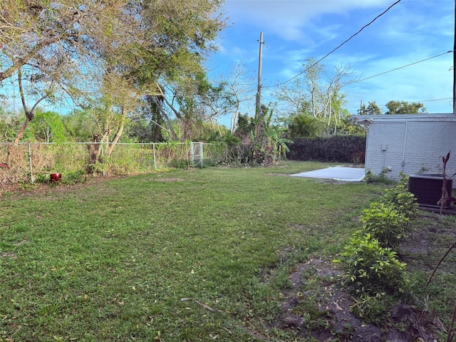 view of yard featuring cooling unit and a fenced backyard