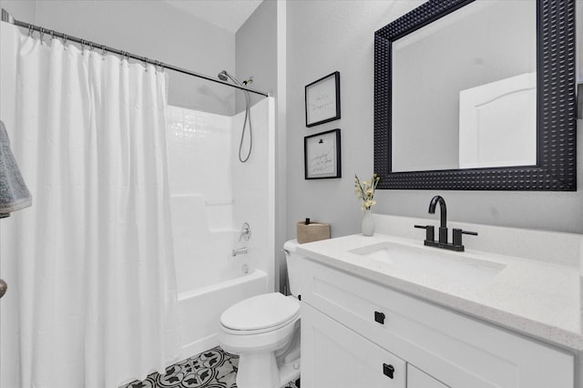 bathroom with toilet, shower / bath combo, and vanity