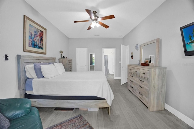 bedroom featuring light wood-style flooring, baseboards, and a ceiling fan