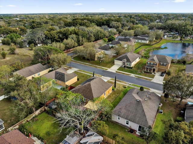 bird's eye view featuring a water view and a residential view