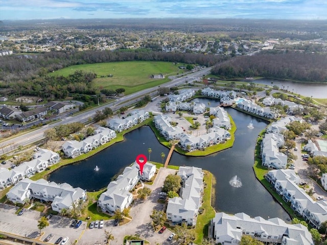 aerial view with a water view and a residential view