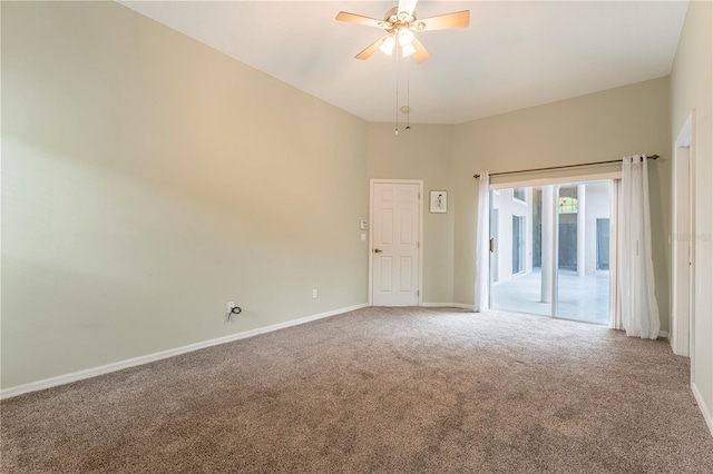 carpeted empty room with baseboards and a ceiling fan