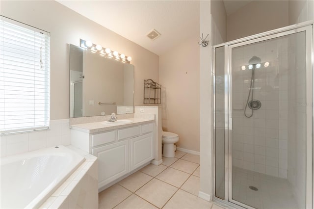 bathroom featuring a garden tub, visible vents, a stall shower, vanity, and tile patterned flooring