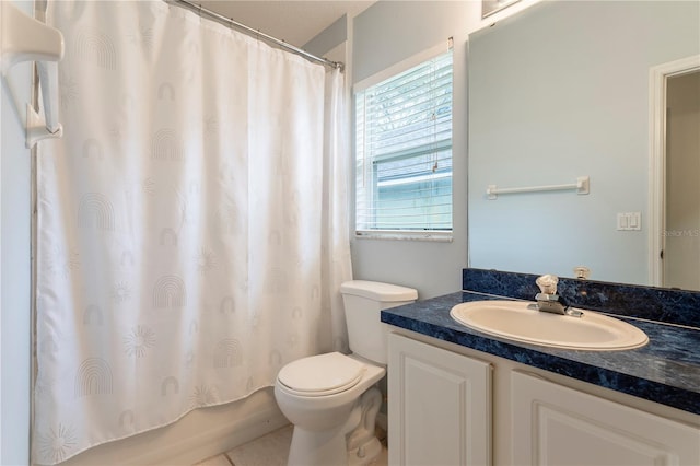 bathroom with shower / bath combination with curtain, vanity, and toilet