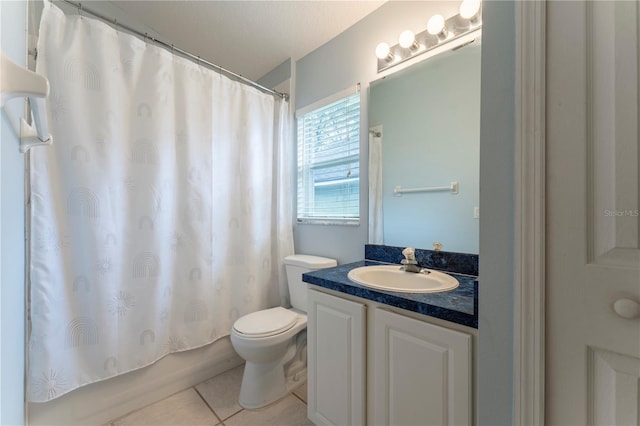 full bath with toilet, vanity, shower / tub combo with curtain, and tile patterned floors