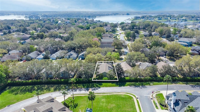 bird's eye view with a water view and a residential view