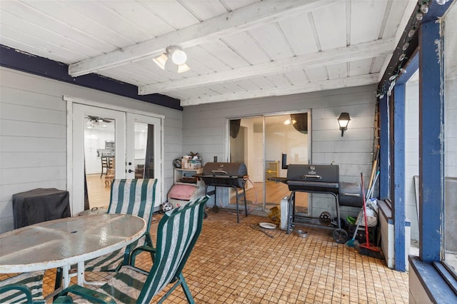 sunroom / solarium with french doors and beam ceiling