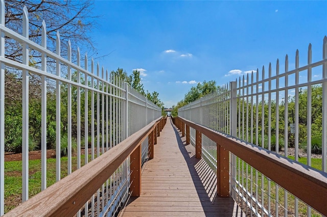 view of community featuring fence