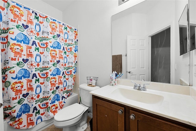 bathroom featuring toilet, shower / bath combo, and vanity