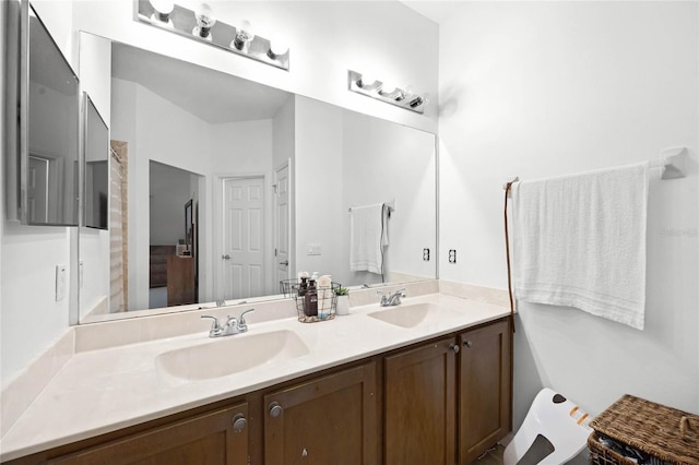 full bath featuring double vanity and a sink