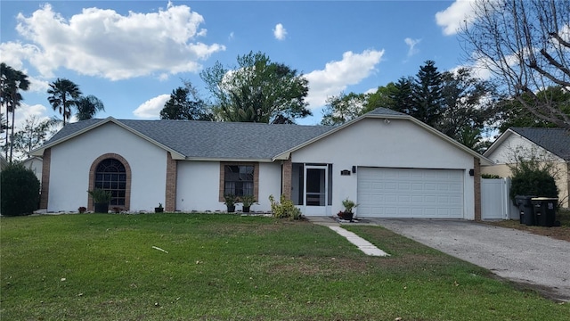 ranch-style home featuring a garage, a shingled roof, concrete driveway, stucco siding, and a front yard