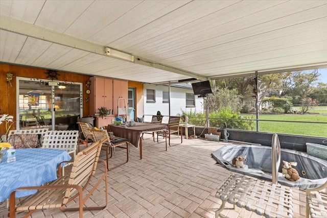 sunroom / solarium with plenty of natural light