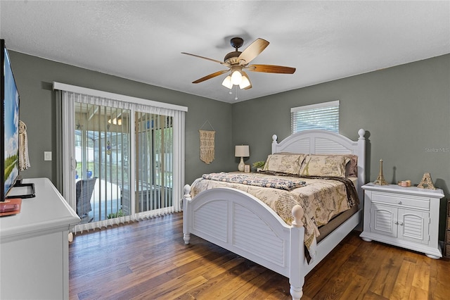 bedroom featuring access to outside, a textured ceiling, a ceiling fan, and wood finished floors