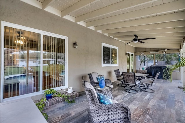 view of patio featuring an outdoor hangout area, outdoor dining area, grilling area, and a ceiling fan