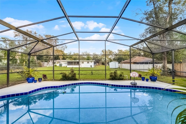 view of pool with a yard, a patio, fence, and a fenced in pool