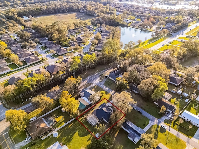 aerial view with a water view and a residential view