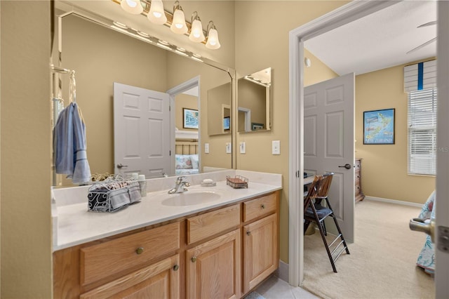 bathroom featuring vanity and baseboards