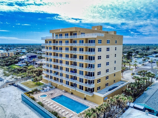 view of property featuring a community pool